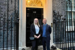 Alun Cairns outside number 10 downing street with Tia