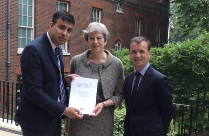 Alun Cairns MP with Moawia and the Prime Minister