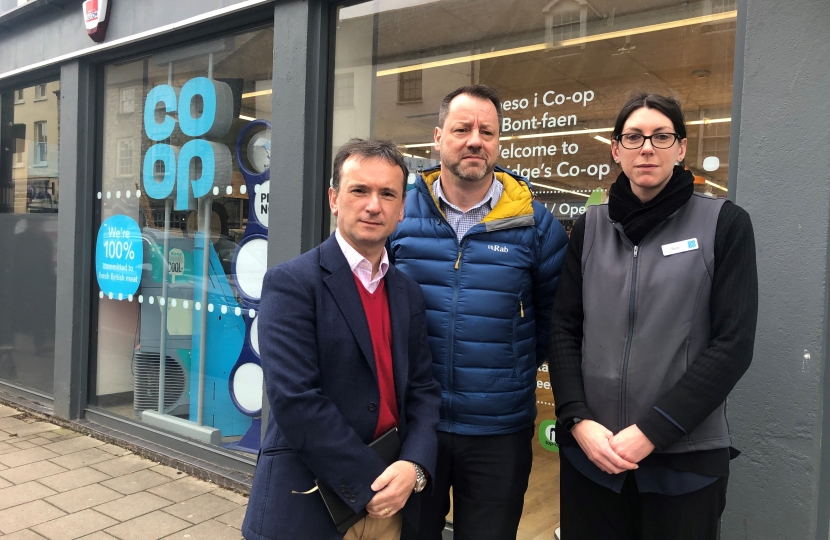 Alun Cairns with the Area Manager and Branch Manager outside the Cowbridge Store.